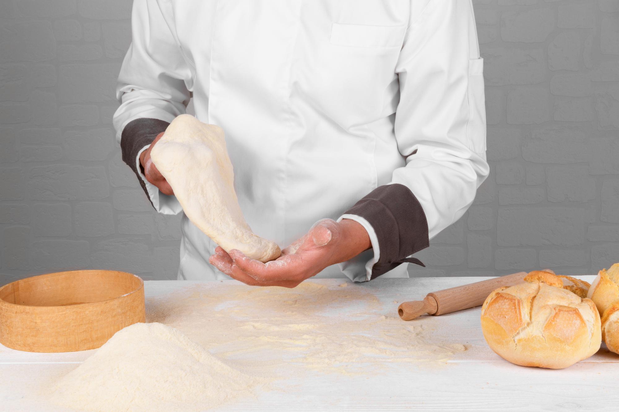 Workshop chef demonstrating dough folding