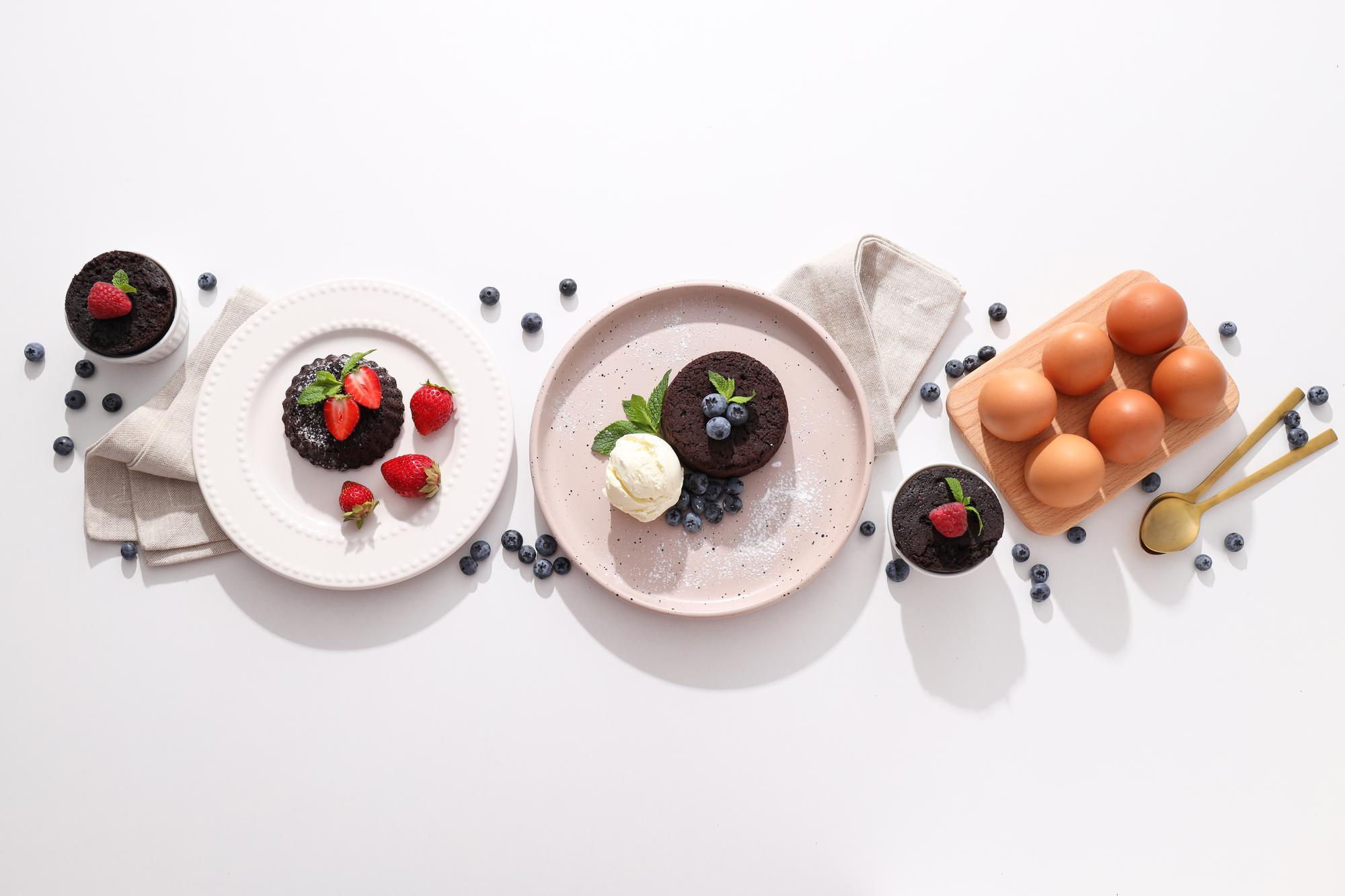 Assorted plated dishes on wooden table